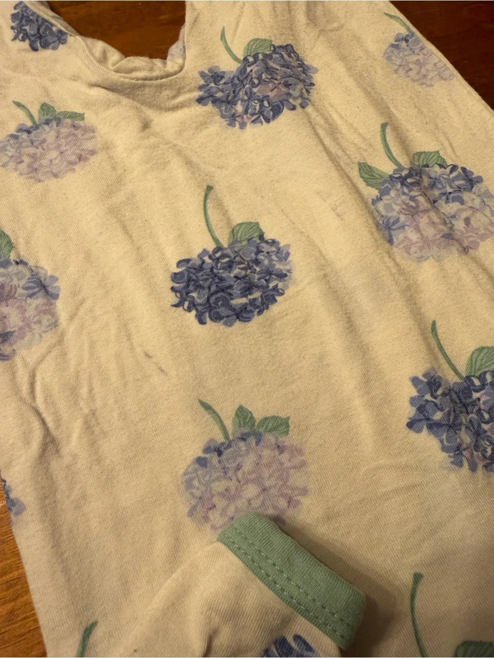 Kyte BABY Cream Footed One-Piece with Blue Hydrangea Print